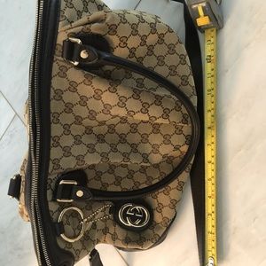 Authentic Gucci handbag with cross body strap
